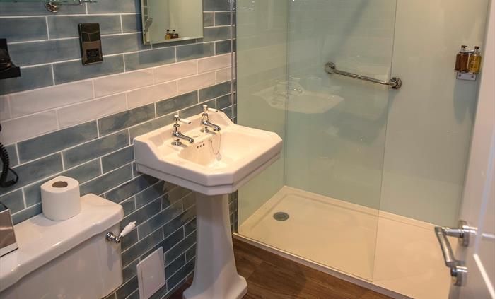 Our newly refurbished bathrooms with their huge walk-in showers cater for our less mobile guests as well as those who enjoy space and luxury.